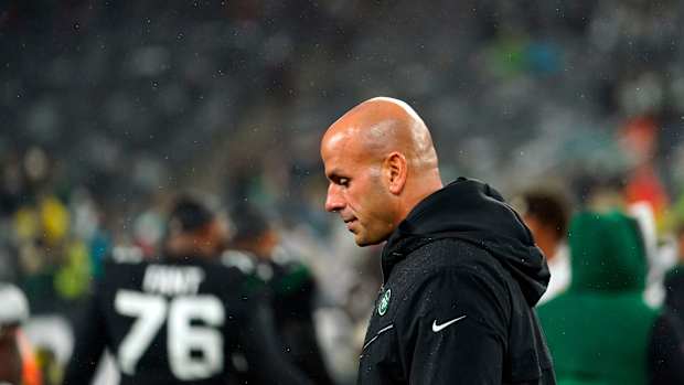 New York Jets head coach Robert Saleh walks off field